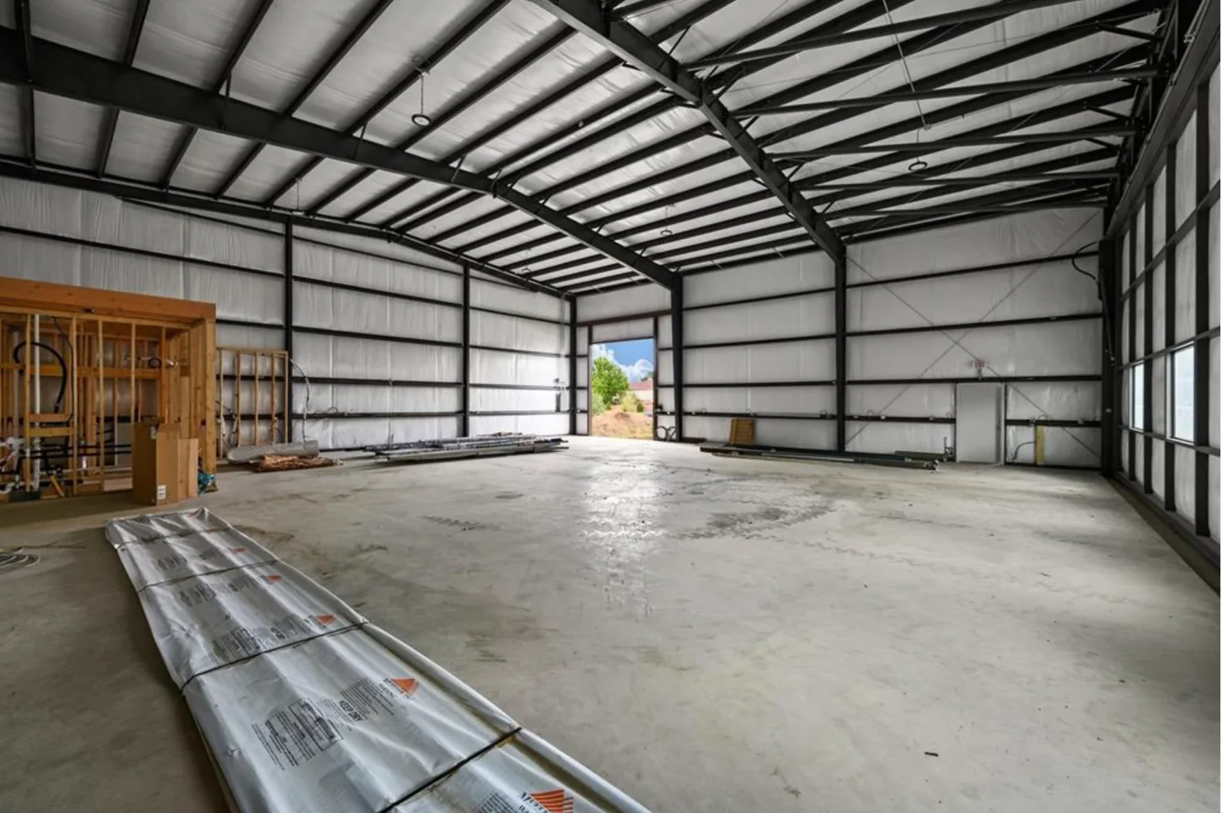 Clear-span steel hangar construction interior