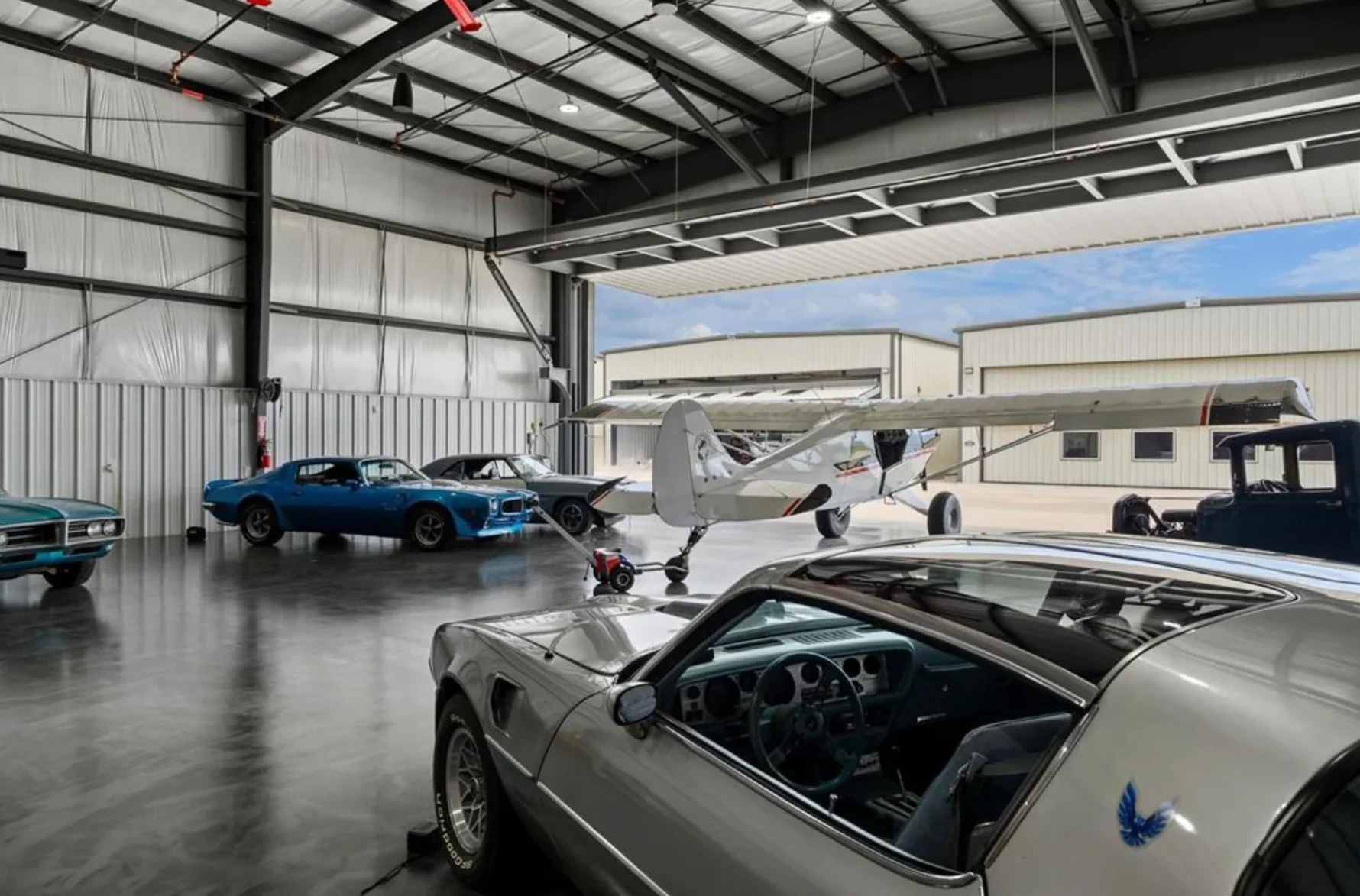 Representative finished hangar with aircraft door open