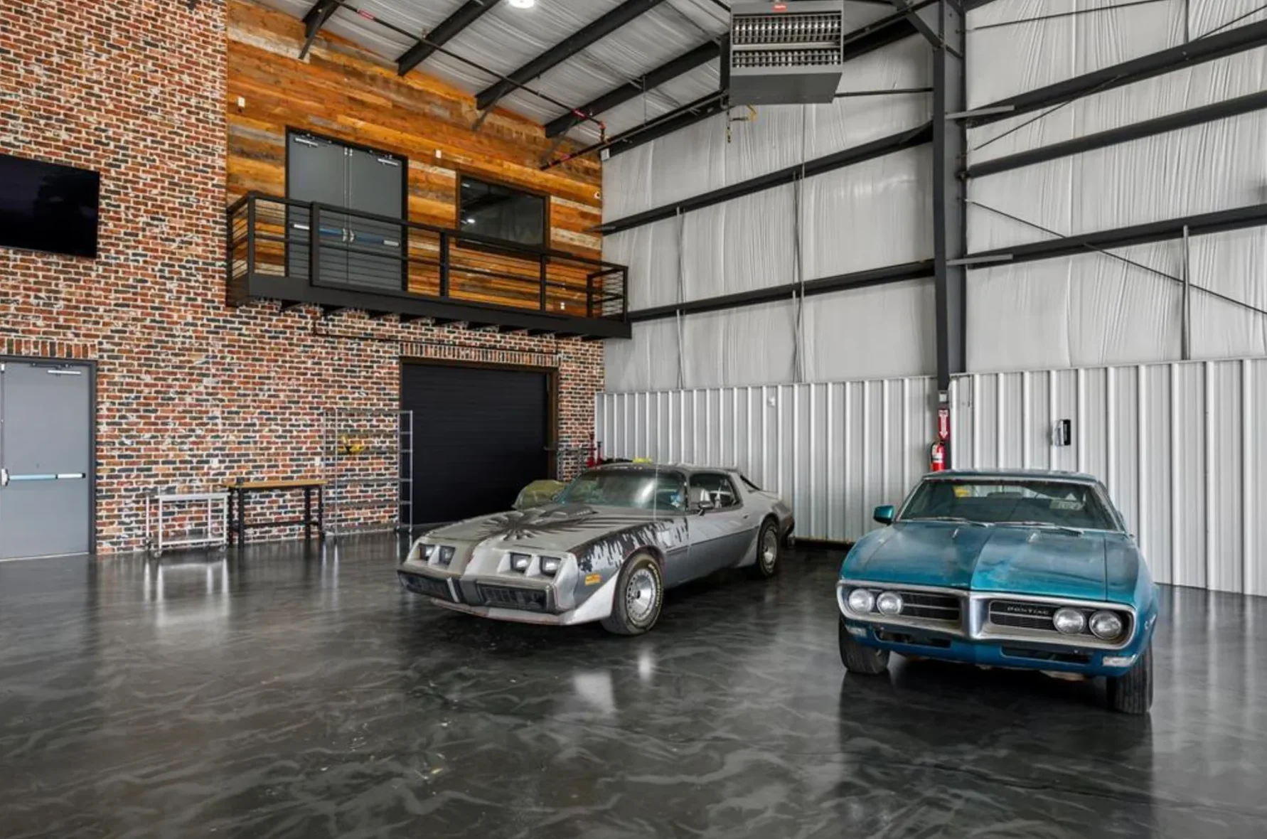 Representative finished hangar with collector vehicles