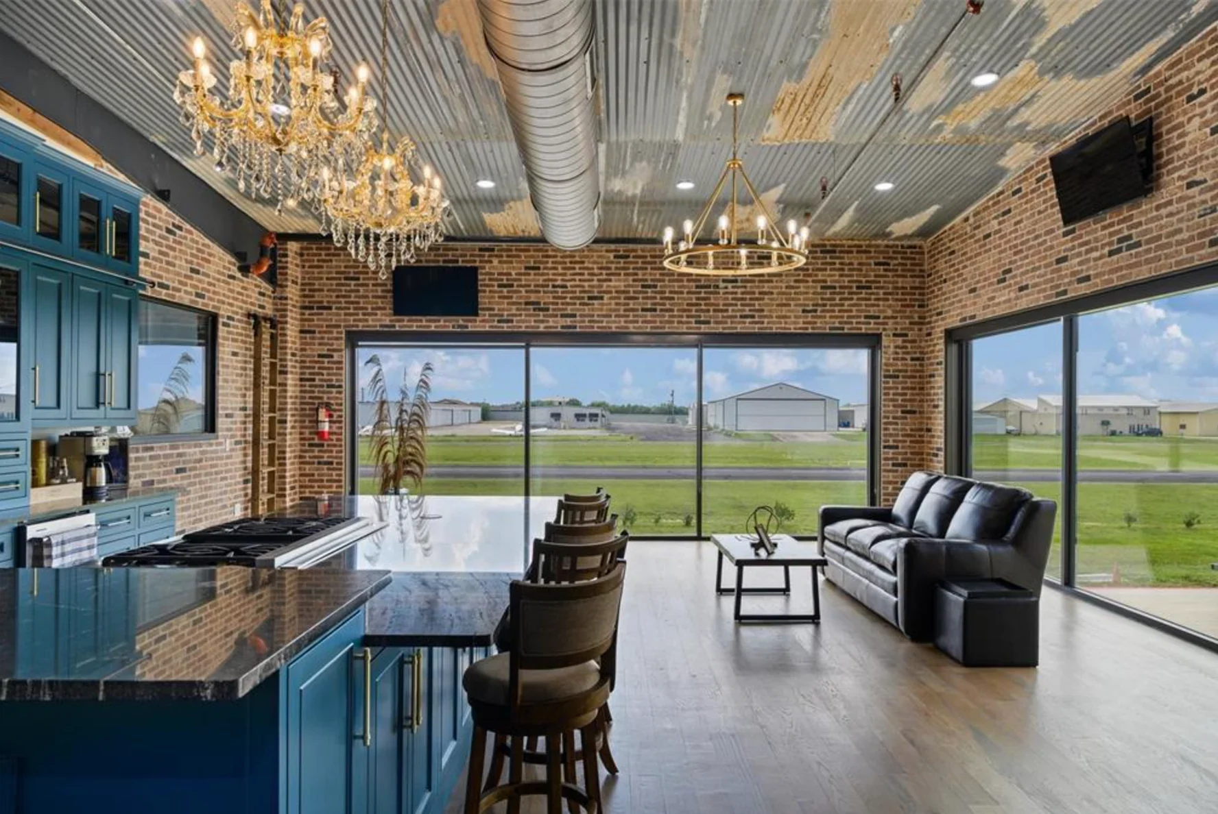 Representative finished hangar living area overlooking runway